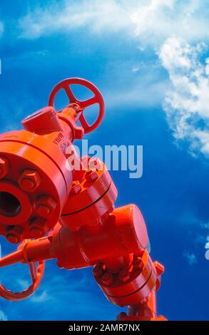 Manual shut-off valve on oil well. Oil well wellhead equipment Stock Photo