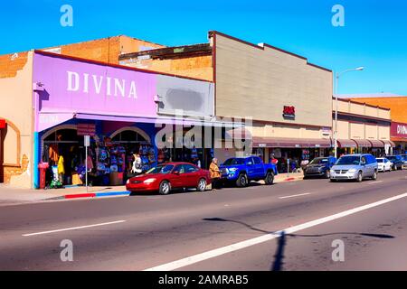 Brightly painted 1950/60s design stores along N Arroyo Blvd in Nogales, AZ Stock Photo