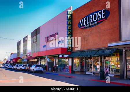 1950/60s architectural design stores along N Morley Ave in the US-Mexican border city of Nogales, AZ Stock Photo