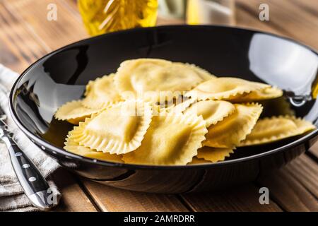 Italian stuffed pasta. Panzerotti pasta in plate. Stock Photo