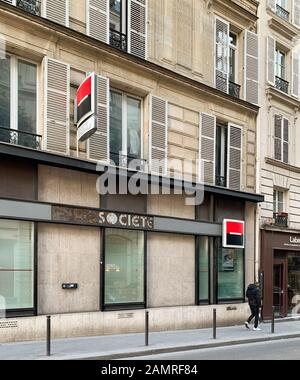 Paris, France - Mar 19, 2019: Societe Generale bank with new square logotype and old signage seen under the rusty facade during renovation Stock Photo
