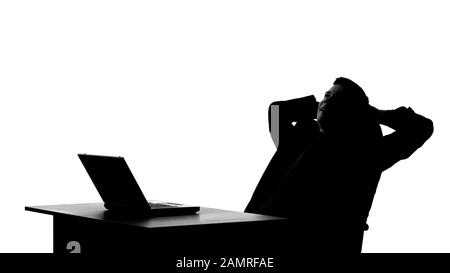 Shadow of writer thinking on idea, inspired writing new chapter on computer Stock Photo