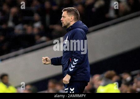 Middlesbrough Manager Jonathan Woodgate celebrates after George Saville of Middlesbrough scores his team's first goal. The Emirates FA Cup, 3rd round replay match, Tottenham Hotspur v Middlesbrough at the Tottenham Hotspur Stadium in London on Tuesday 14th January 2020. this image may only be used for Editorial purposes. Editorial use only, license required for commercial use. No use in betting, games or a single club/league/player publications . pic by Steffan Bowen/Andrew Orchard sports photography/Alamy Live news Stock Photo