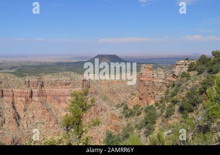 Summer in Arizona: Looking East to Cedar Mountain, Little Colorado River Gorge & Painted Desert from Desert View Watchtower on Grand Canyon South Rim Stock Photo