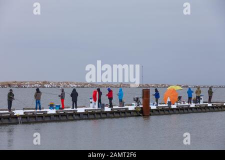 Fishermen along the Steveston waterfront on a cold winter day in British Columbia Stock Photo