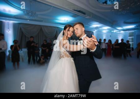 First wedding dance groom and bride in restaurant Stock Photo