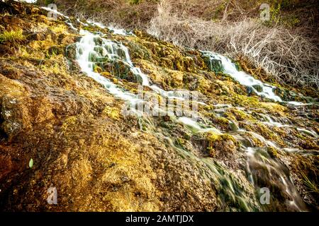 stone water channel full of running water in Tierra del Trigo village Stock Photo