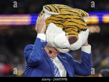 New Orleans, LA, USA. 13th Jan, 2020. ESPN analyst Lee Corso makes his pick by putting on the LSU Tiger head gear during their pregame show before the College Football National Championship between the Clemson Tigers and the LSU Tigers at the Mercedes Benz Superdome in New Orleans, LA. Jonathan Mailhes/CSM/Alamy Live News Stock Photo
