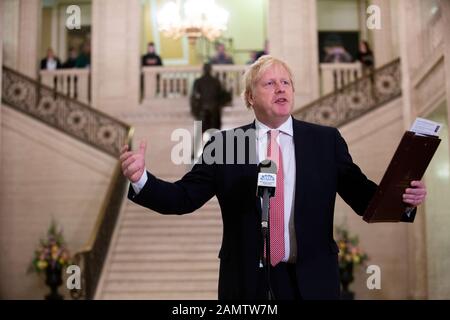 Belfast, UK. 13th Jan, 2020. UK Prime Minister, Boris Johnson makes a public statement to press at Stormont Parliament Buildings after a joint meeting with Taoiseach Leo Varadkar following the restoration of the Northern Ireland Assembly. Credit: SOPA Images Limited/Alamy Live News Stock Photo