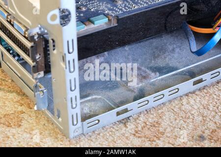 Dust and hair inside an untidy computer case. Stock Photo