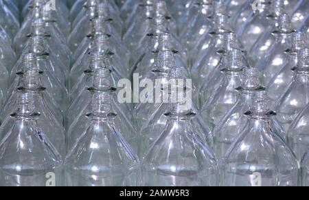 Rows of empty glass bottles with no caps Stock Photo
