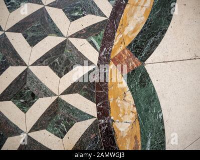 Antique geometric marble floor mosaic design Stock Photo