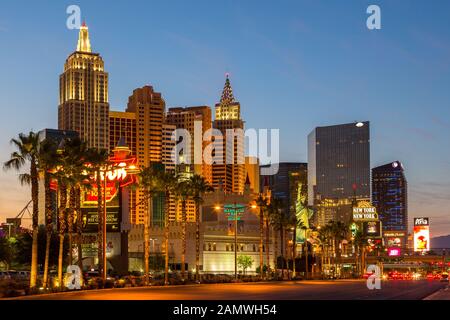 Las Vegas, Nevada, USA- 01 June 2015: View of hotels and cassino, glass skyscrapers at Las Vegas Boulevard. Colorful advert. Night illuminations.