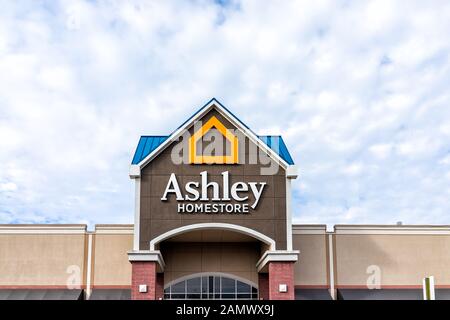 Sterling, USA - November 21, 2019: Ashley homestore store sign by entrance of store in Fairfax county, Virginia Stock Photo