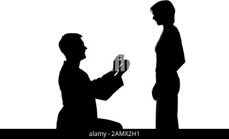Young man shadow making proposal to lady, marriage offer, romantic relations Stock Photo