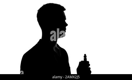 Young man shadow holding electronic cigarette, device creating tobacco feeling Stock Photo