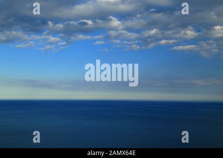 Sea, clouds and sky background, cumulus clouds Stock Photo