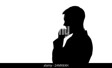 Serious man silhouette thinking over creative idea, startup, business planning Stock Photo