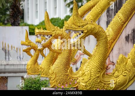 Dragons statues at Haw Phra Kaew, also written as Ho Prakeo, Hor Pha Keo, Vientiane, Laos. Stock Photo