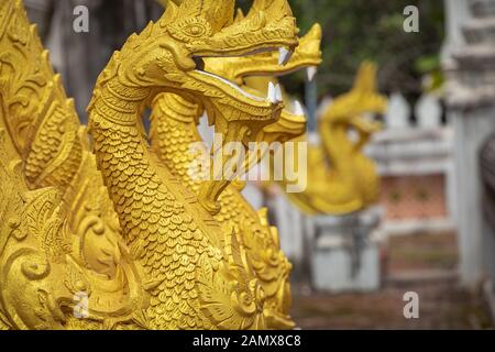 Dragons statues at Haw Phra Kaew, also written as Ho Prakeo, Hor Pha Keo, Vientiane, Laos. Stock Photo