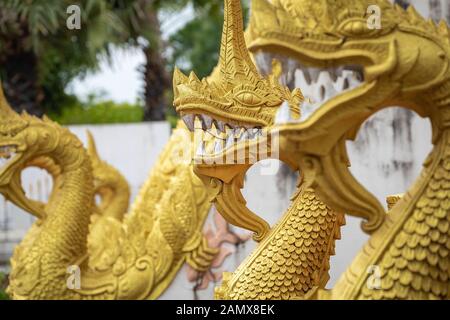 Dragons statues at Haw Phra Kaew, also written as Ho Prakeo, Hor Pha Keo, Vientiane, Laos. Stock Photo