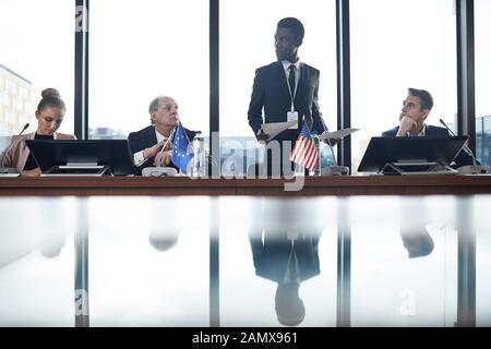 African young businessman performing with his report at business conference Stock Photo