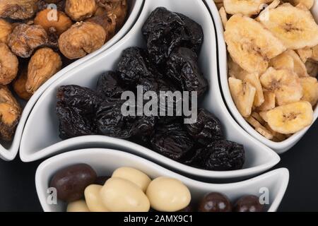 Close up of mix of dried fruits and nuts. Symbols of christmas holiday. Stock Photo