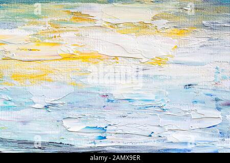 Brushstrokes of oil paint on the canvas. Hand drawn artistic painting. White, blue, yellow colored fragment of a modern artwork. Strokes of paint. Stock Photo