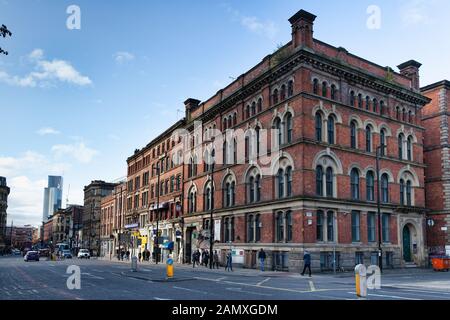 Manchester, UK - 20 October 2019: Corner of Portland St and Charlotte St showing typical red brick buildings Stock Photo