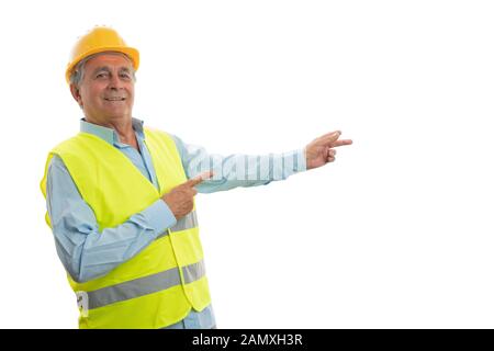 Old builder man presenting blank copyspace for advertising with index fingers and friendly expression isolated on white Stock Photo