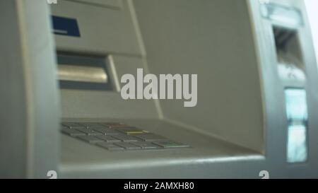 Automated teller machine close up, buttons on ATM, secure money withdrawing Stock Photo