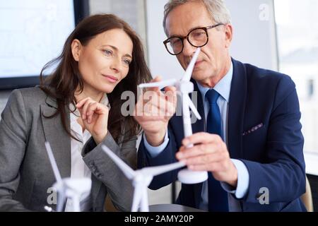 Business couple having serious conversation Stock Photo