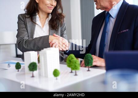 Close up of business partners shaking hands Stock Photo