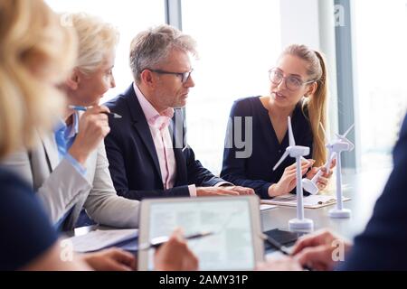 Business people having serious conversation in the conference room Stock Photo