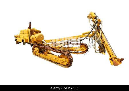 Tracked bulldozer with drilling machine for work along road. Work in progress, industrial machine. Isolated on white background with copy space. Stock Photo