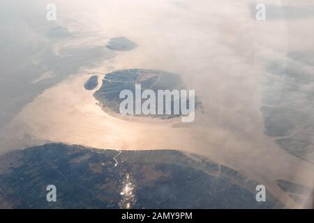 Aerial View of the magnificent Bramhaputra River in Bangladesh from the airplane. selective focus. Stock Photo