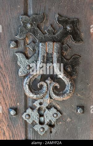 An old wrought iron door handle, UK Stock Photo