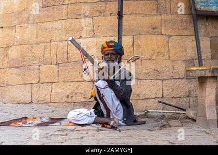 Elderly Man playing Sitar Stock Photo