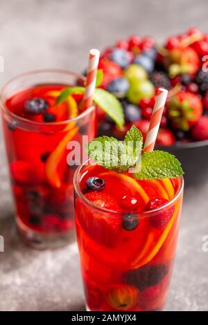 A refreshing drink made from fresh summer berries with lemon and mint. Stock Photo