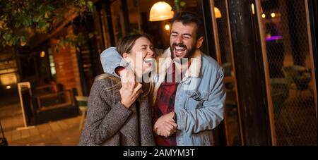 Young couple in city is having fun Stock Photo