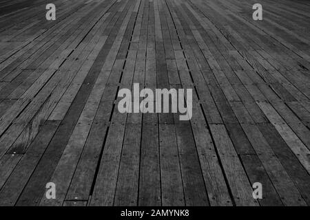 Symmetrical wooden floor texture of pier in black and white Stock Photo