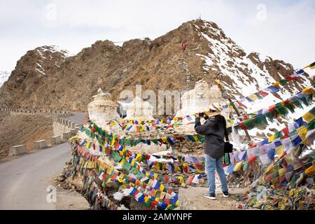 Travelers thai women people travel visit relax and use mobile phone take photo Thiksey monastery and Namgyal Tsemo Gompa in Jammu and Kashmir, India i Stock Photo