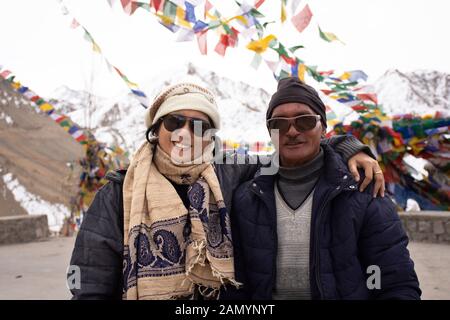 JAMMU KASHMIR, INDIA - MARCH 20 : Travelers thai women journey visit and posing portrait with Indian driver Thiksey monastery and Namgyal Tsemo Gompa Stock Photo