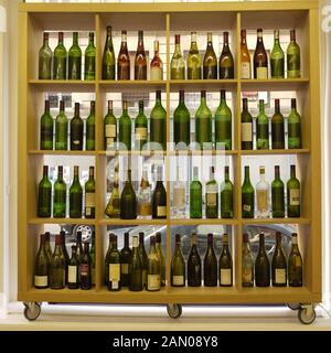Wine bottles displayed in a shop in Paris Stock Photo