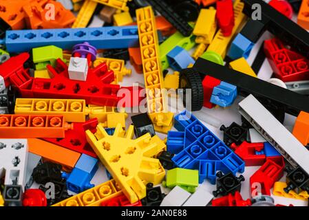 Multi-colored toy bricks for children. Elements and objects constructor toys. Educational and educational games. Stock Photo