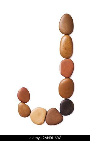 Letter J made of marine small pebbles, top view. Alphabet made of stones Isolated on a white background Stock Photo