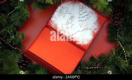 Gift box decorated with sugar powder and figures, hand-made Christmas presents Stock Photo