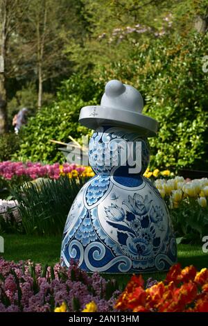 Traditional Blue Dutch statue in Keukenhof gardens the Netherlands Stock Photo