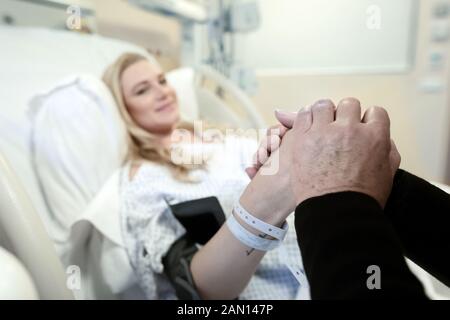 Pregnant woman preparing for childbirth, happy expectant girl having support from mom in the prenatal hospital, family love and new life concept Stock Photo