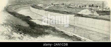 Sessional papers of the Dominion of Canada 1909 . Channelling Machine at Wurk.. Chicago Main Drainage Canal. Channelled sides of excavation. GEORGIAN BAY SHIP CAXAL SURVEY 73 SESSIONAL PAPER No. 19a crib-work alone has stood thirty ye^-rs of very heavy service. (See lock sites, Plates38 to 45, and cross section of pier, Plate 19a.) These walls extend 2,000 feet above and 2,000 feet below the lock where possible;a length sufficient for a couple of boats 600 feet long to tie np along and await theirturn for locking. The pier is only provided on one side of the channel, the otherside being left c Stock Photo